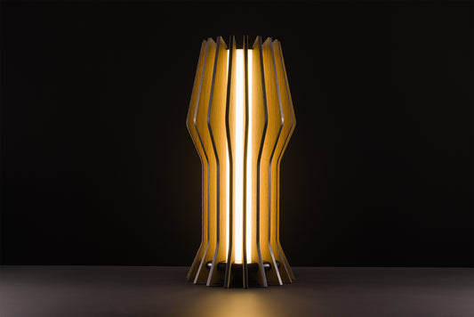 Futura table lamp in natural oak, handcrafted Italian design, sculptural minimal style, vintage elegance, warm light, studio black background.