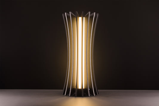 Vertigo table lamp in dark stained walnut, handcrafted Italian design, sculptural minimal style, refined elegance, warm light, studio black background.