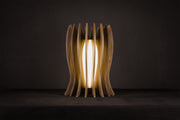 Handcrafted LED table lamp made from solid Canaletto walnut with a gold lacquered stainless steel frame, pure linen wrapped plexiglass diffuser and warm 2700K LED lighting, artisan made in Italy.