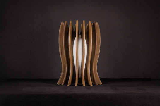 Modern Italian artisan table lamp crafted from solid Canaletto walnut featuring a gold lacquered stainless steel structure, linen-covered plexiglass shade and integrated warm white 2700K LED illumination.