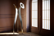Luxury Tulip coat hanger featuring handcrafted Italian design with premium black textured finish and gold details.