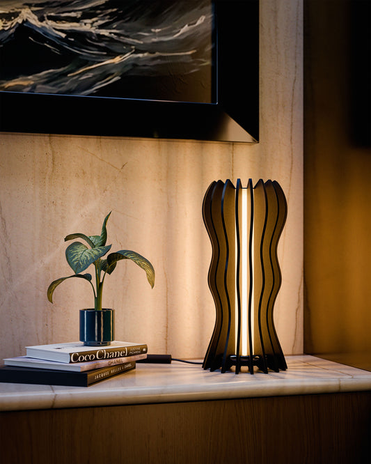 Medusa luxury table lamp inspired by sea jellyfish, set in an elegant modern living space, crafted in Italy and designed by Vera Forma.