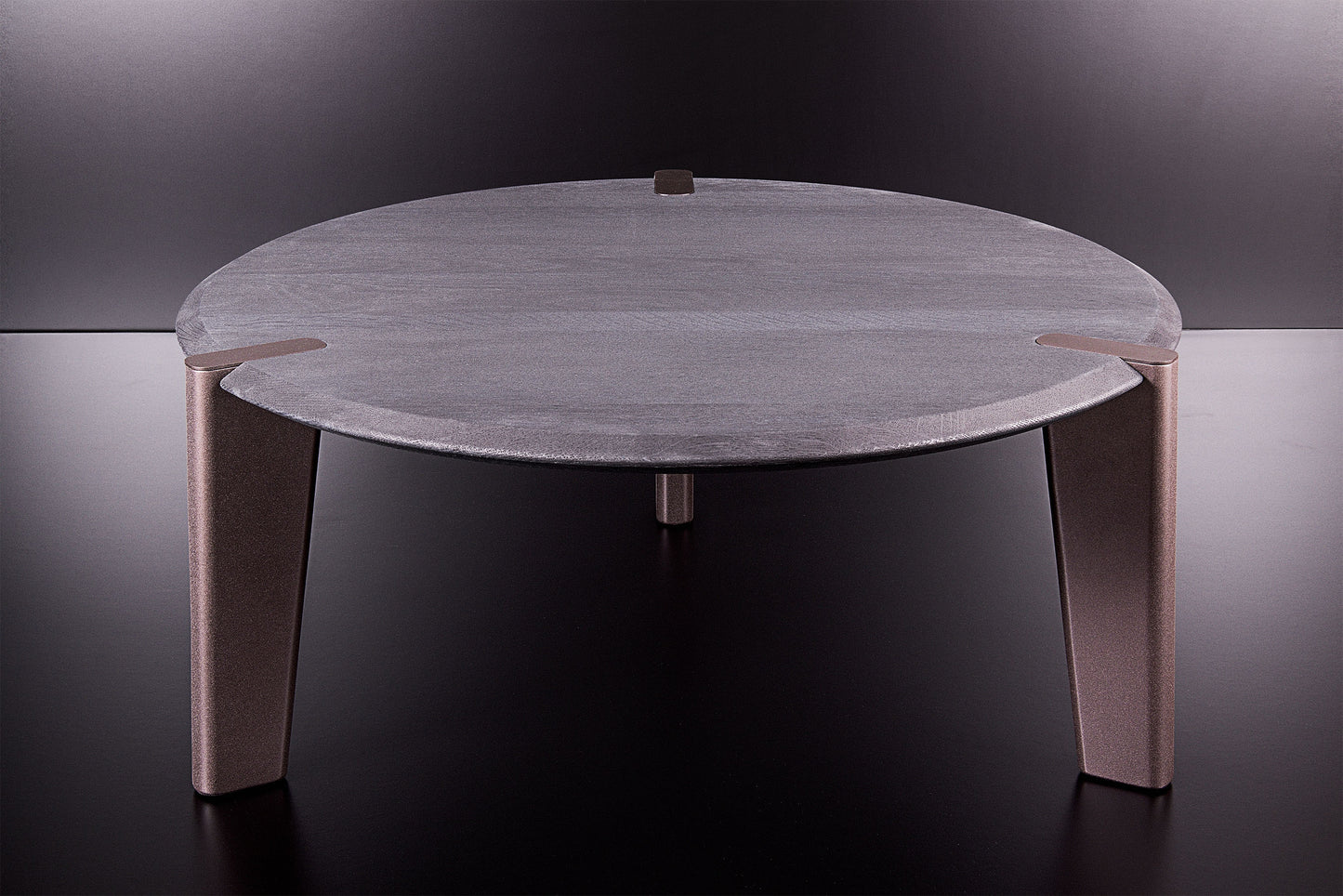 Handmade Edones coffee table in ultra-matte black oak, bronze metallic legs, refined Italian craftsmanship, by Vera Forma.