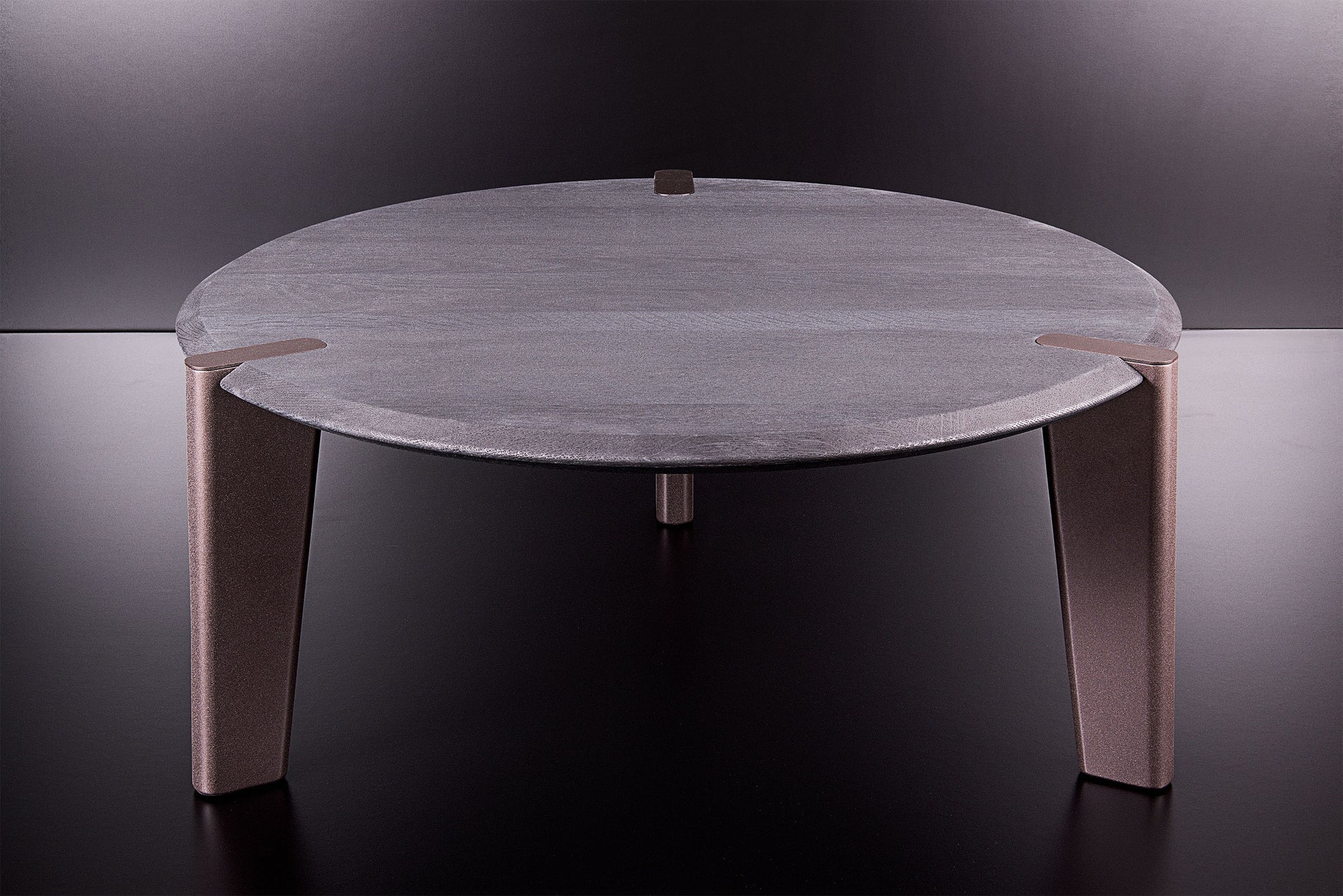 Handmade Edones coffee table in ultra-matte black oak, bronze metallic legs, refined Italian craftsmanship, by Vera Forma.