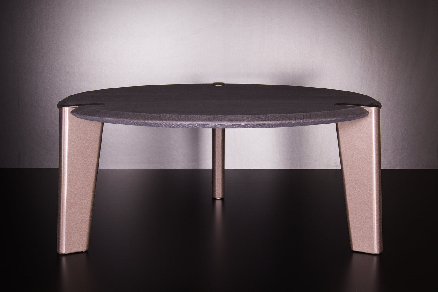 Edones coffee table in solid black oak with textured bronze legs, handcrafted in Italy, modern minimalist luxury design by Vera Forma.
