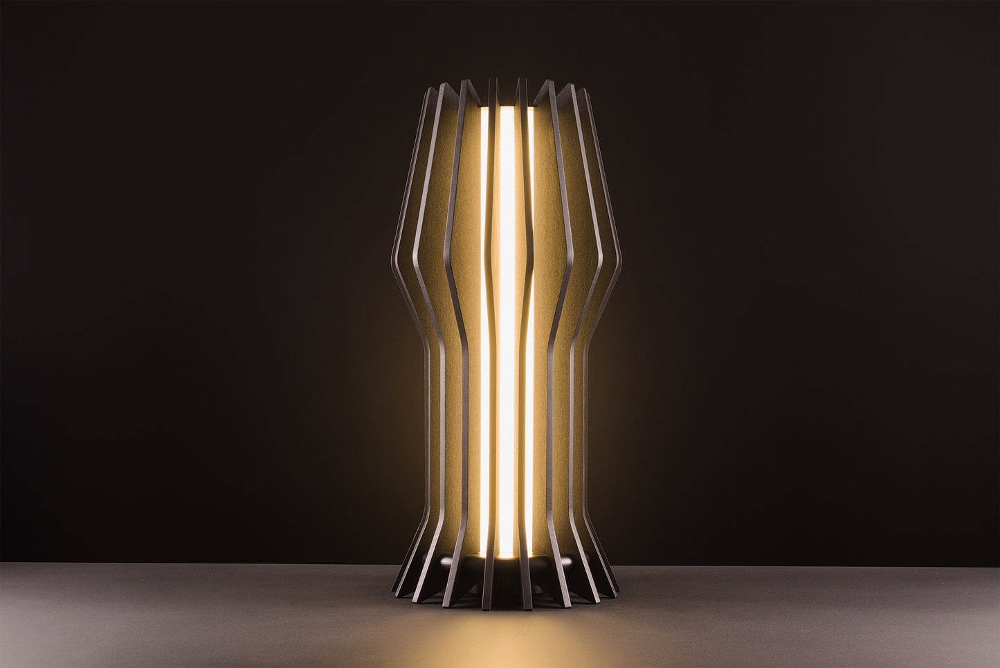 Futura table lamp in dark walnut, handcrafted Italian design, sculptural minimal style, high gloss details, warm light, studio black background.