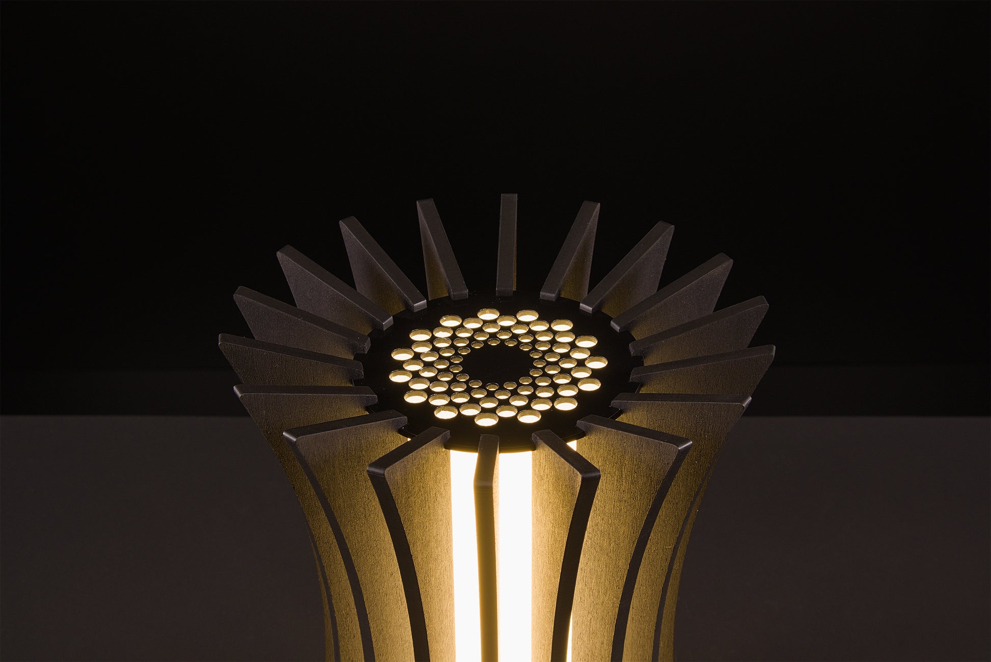 Luxury Gothica lamp in dark stained walnut, Italian handmade craftsmanship, soft warm LED, photographed in studio on black.