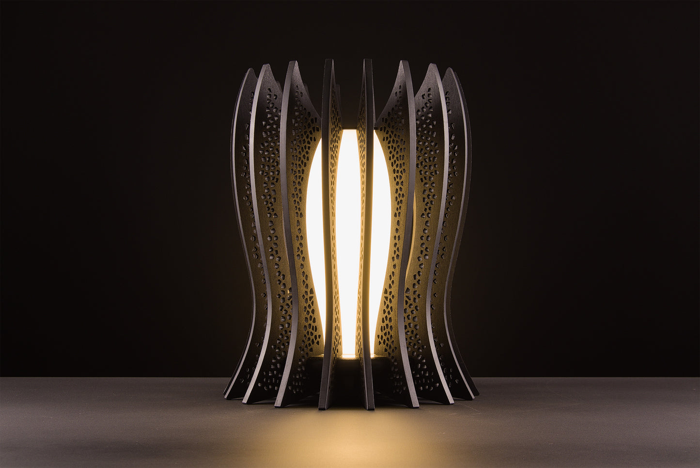 Lady Noir lamp in dark stained walnut, Italian handcrafted luxury design, warm 2700K LED, photographed on black studio background.
