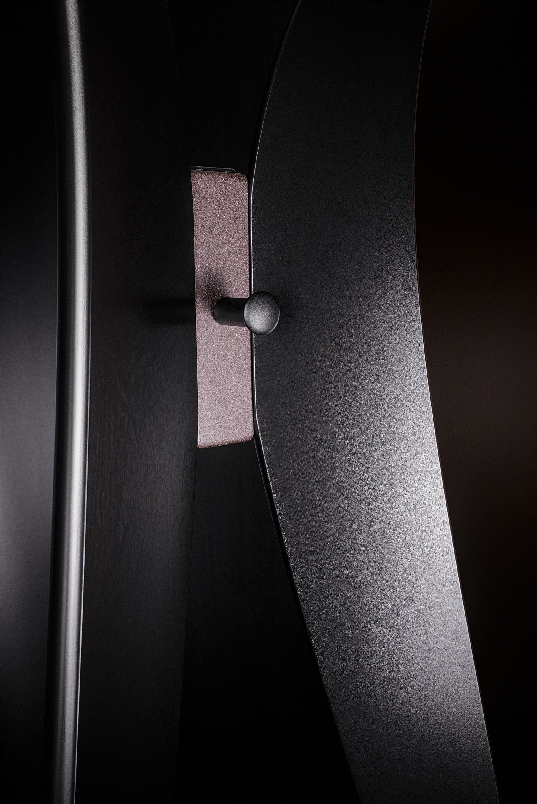 Handcrafted Tulip floor coat hanger in black satin paint, bronze details, modern Italian luxury design by Vera Forma.