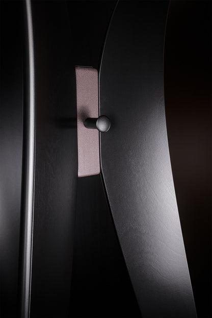Handcrafted Tulip floor coat hanger in black satin paint, bronze details, modern Italian luxury design by Vera Forma.