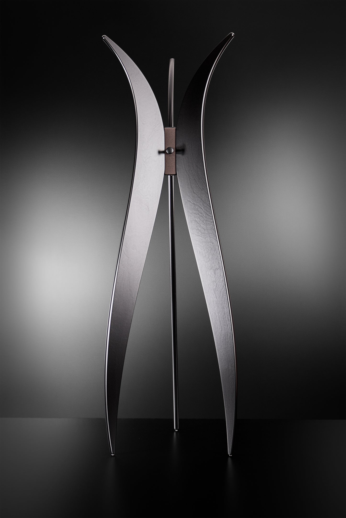 Tulip floor coat rack in black materic paint with bronze details, handcrafted in Italy, modern luxury design by Vera Forma.