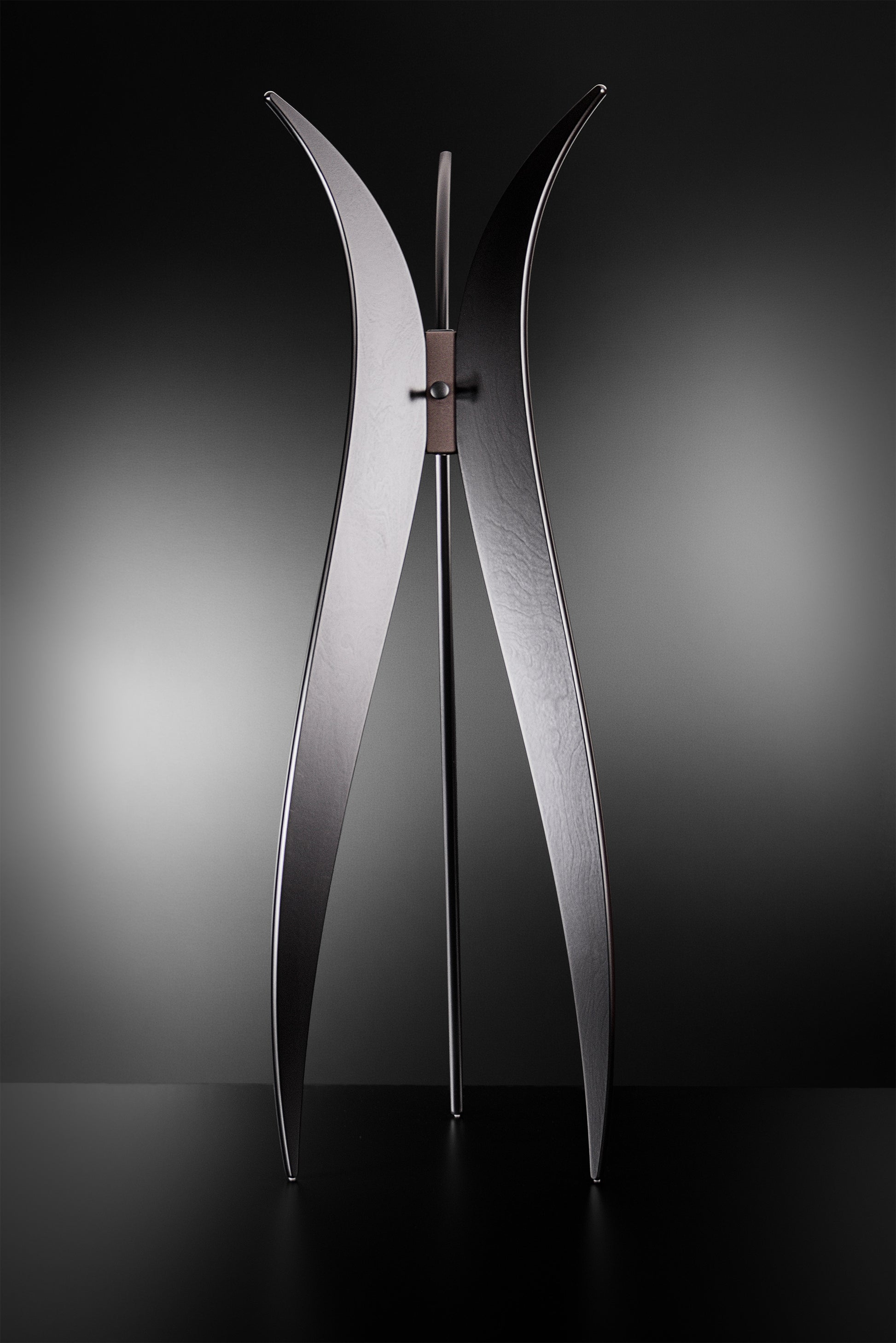 Tulip floor coat rack in black materic paint with bronze details, handcrafted in Italy, modern luxury design by Vera Forma.
