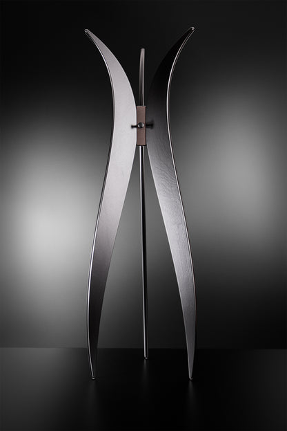Tulip floor coat rack in black materic paint with bronze details, handcrafted in Italy, modern luxury design by Vera Forma.