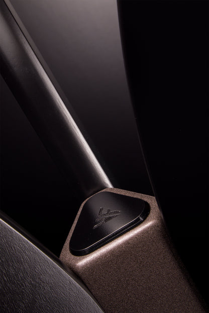 Minimalist Tulip floor coat rack in satin black materic paint with bronze accents, handmade in Italy, refined design by Vera Forma.